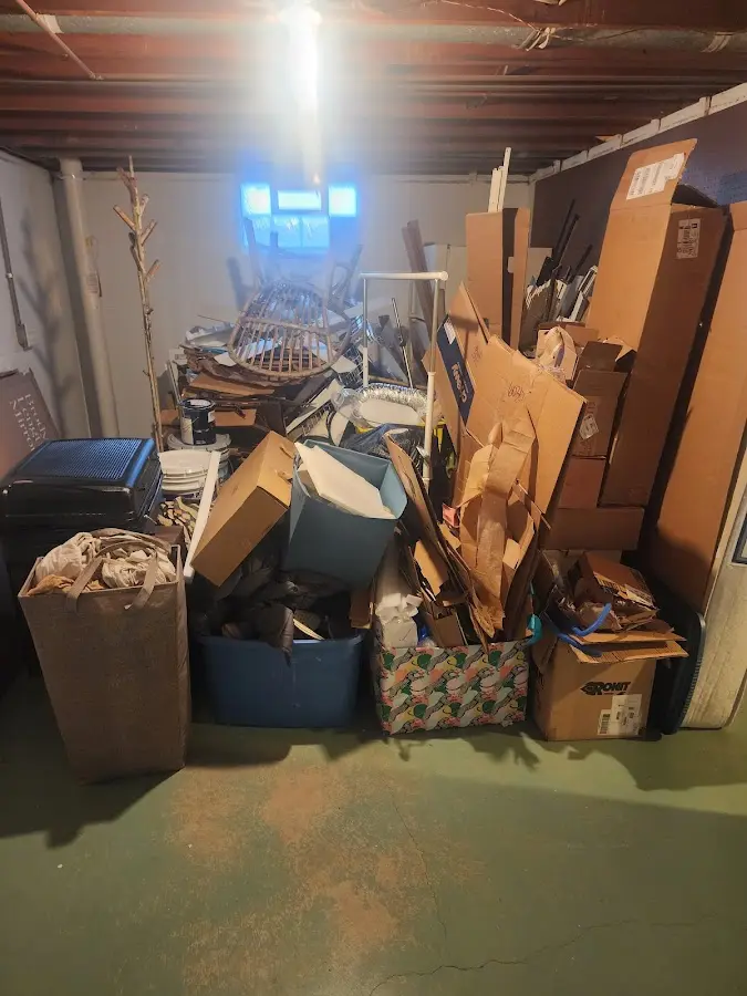 Roll-off dumpster container at job site for 6 Yard Dumpster Rental in Groves